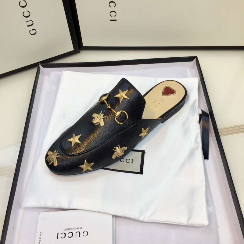 G*u*i slippers